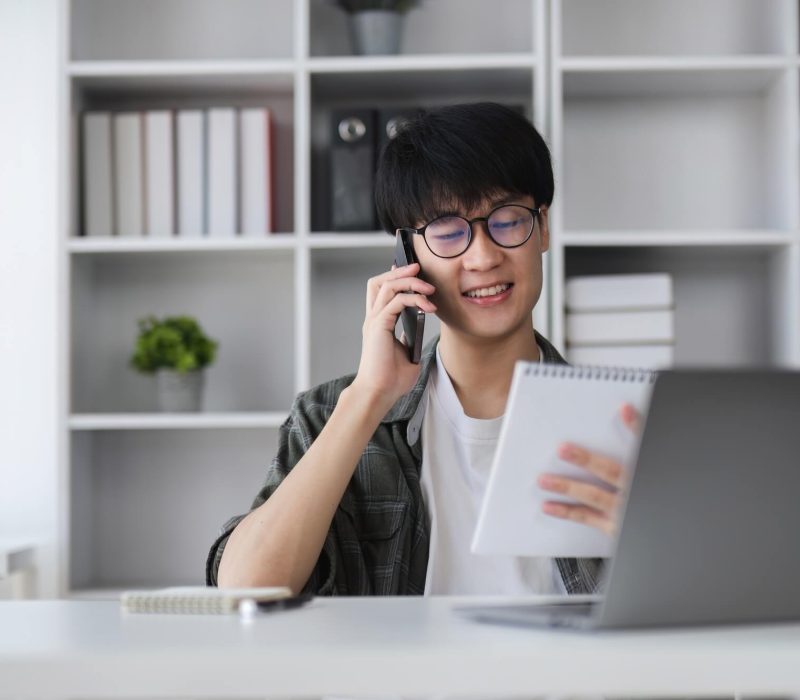 young-asian-man-uses-laptop-to-work-on-financial-management-financial-transactions-and-use-of.jpg
